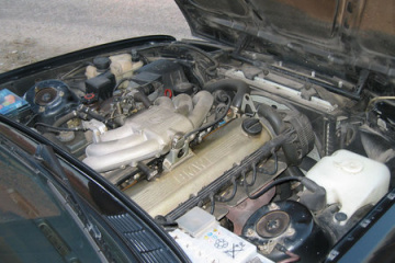 Замена двигателя внутреннего сгорания М30, а также деталей: прокладки картера и сальника коленвала BMW 7 серия E23