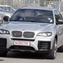 Прототип нового BMW X6 практически расстался с камуфляжем