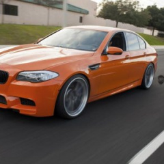 BMW M5 в кузове F10 цвета Valencia Orange