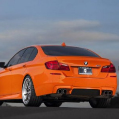 BMW M5 в кузове F10 цвета Valencia Orange