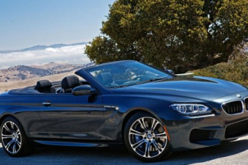 Девушка тестирует BMW 6 series Coupe 2011 BMW 6 серия F12-F13