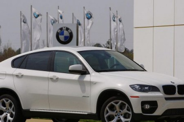 BMW X6 xDrive50i и BMW X5 4.8i BMW X6 серия E71