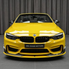 Кабриолет М4 от BMW в уникальном жёлтом цвете Speed Yellow у официального дилера