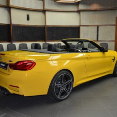 Кабриолет М4 от BMW в уникальном жёлтом цвете Speed Yellow у официального дилера
